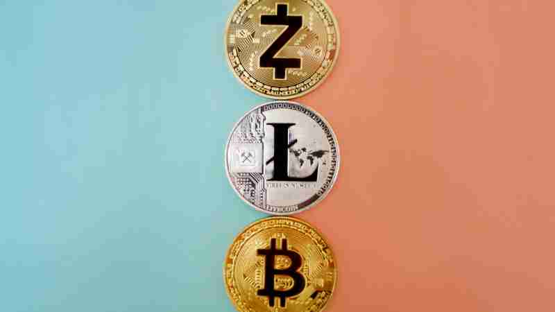Colorful display of Zcash, Litecoin, and Bitcoin coins on gradient background., tags: 2026 – bei - pexel